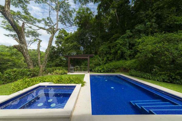 View of the Jacuzzi and the swimming pool and rancho at Casa Forest in Los Suenos